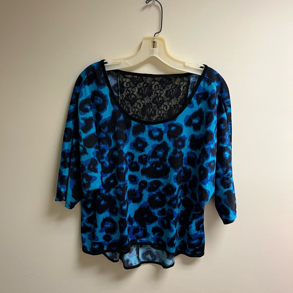 Vibrant Blue Leopard Print Blouse with Lace Detail